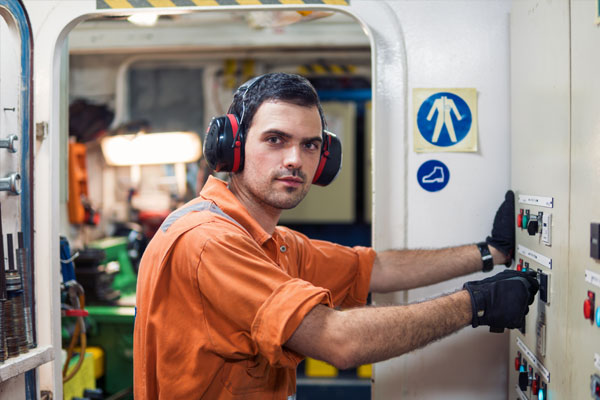 Marine Engineer Officer Working in Engine Room